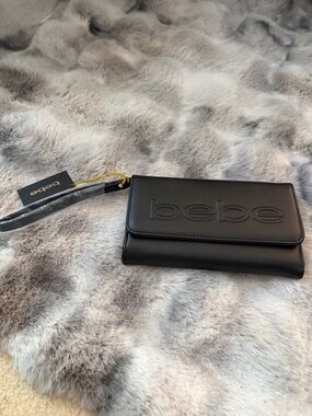 NWT Bebe Black Embossed Logo Clutch Wristlet
